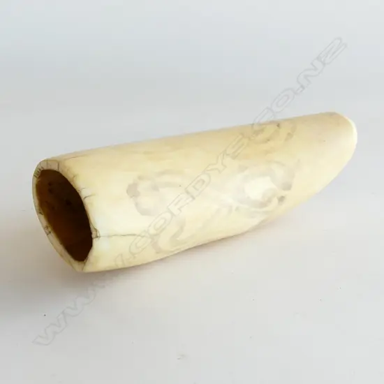 A polished old whales tooth (Tabua),